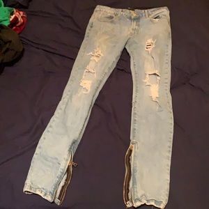 Forver 21 skinny ripped jeans with leg zipper.